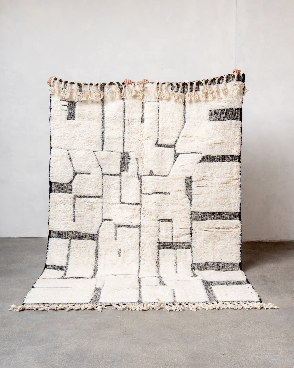 Modern, designer, handcrafted Berber rug from Morocco. Beniourain carpet with beautiful colours and patterns and fluffy wool texture